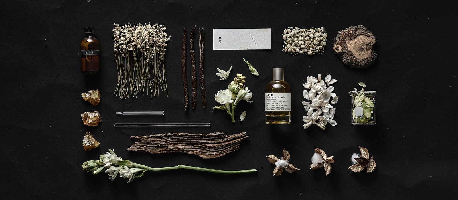 Le Labo Lys 41 eau de parfum bottle with white lily and tuberose flowers