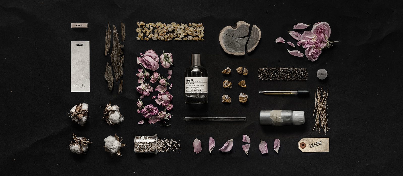 Le Labo Rose 31 eau de parfum bottle with dried centifolia rose petals and cedar
